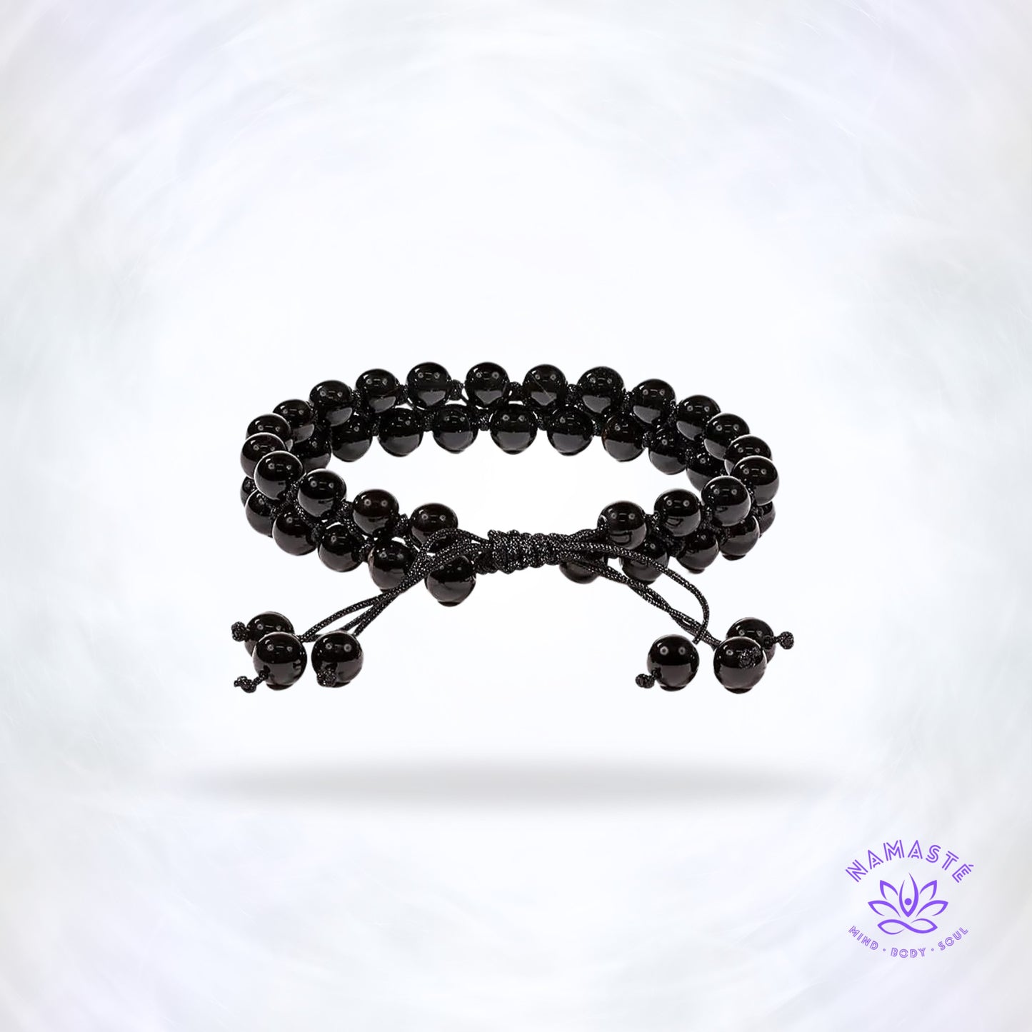 Armband met dubbele rij zwarte agaat – aardende edelsteen die stabiliteit, kalmte en innerlijke rust brengt. Verstelbaar design voor elke pols.