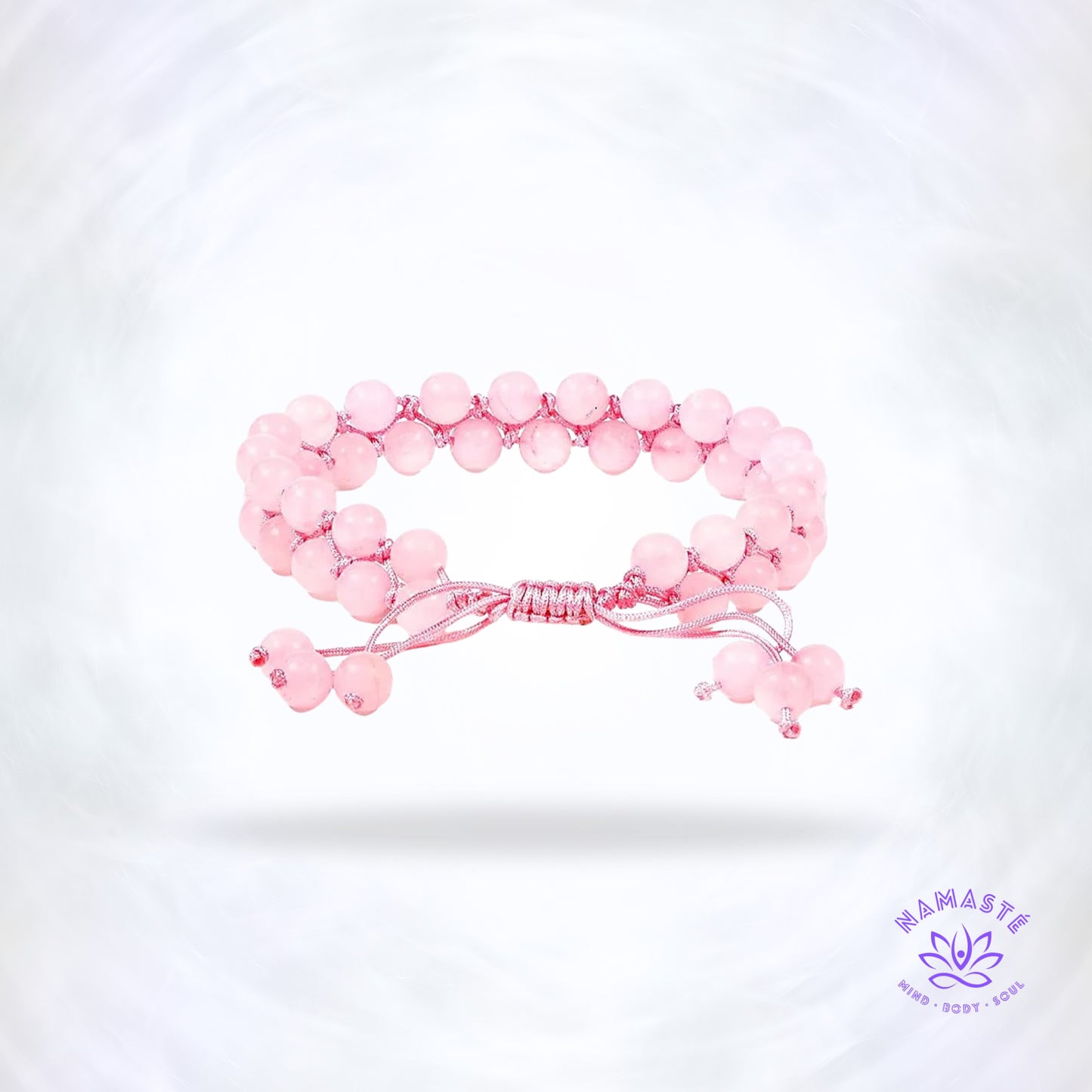 Armband met dubbele rij rozenkwarts – liefdevolle edelsteen die harmonie, zelfliefde en warmte stimuleert. Verstelbaar design voor elke pols.