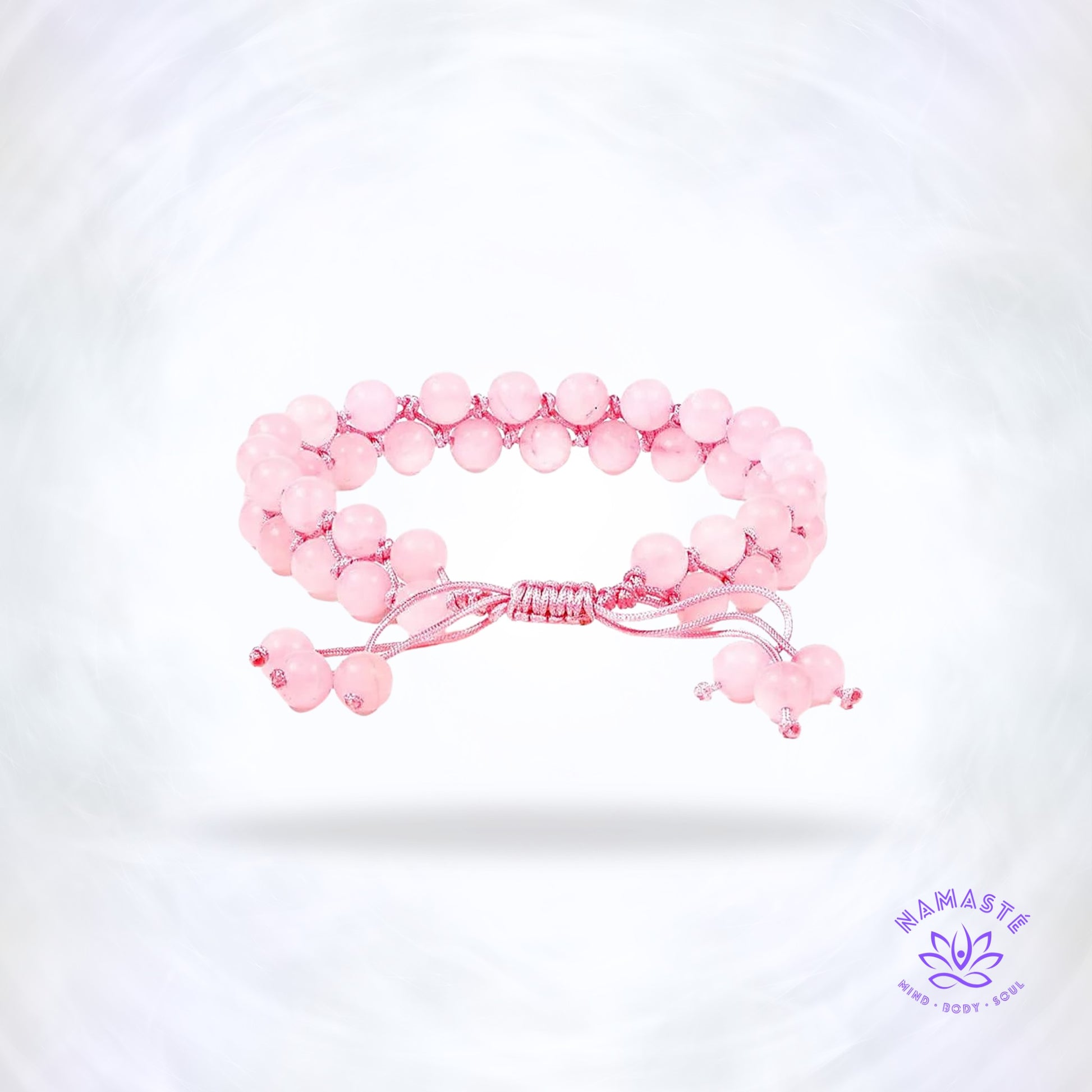 Armband met dubbele rij rozenkwarts – liefdevolle edelsteen die harmonie, zelfliefde en warmte stimuleert. Verstelbaar design voor elke pols.