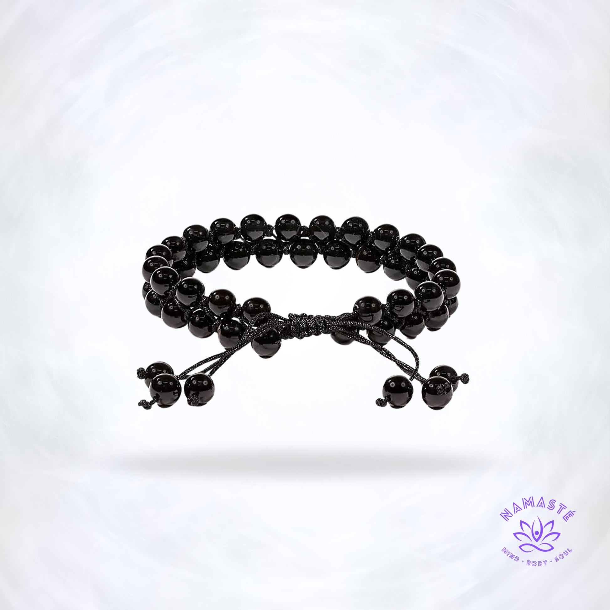 Armband met dubbele rij zwarte agaat – aardende edelsteen die stabiliteit, kalmte en innerlijke rust brengt. Verstelbaar design voor elke pols.