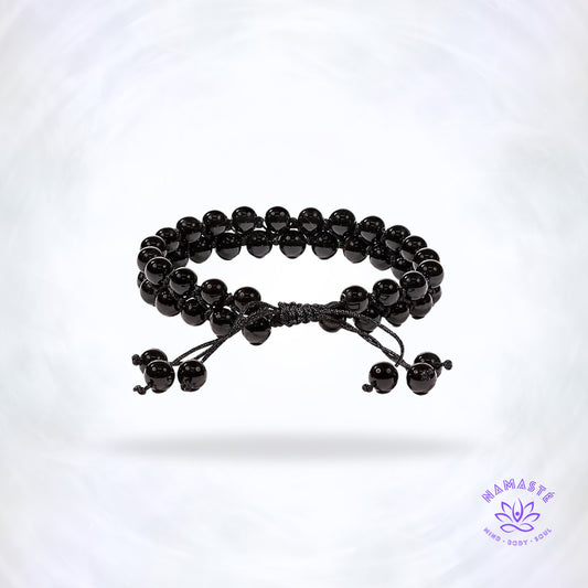 Armband met dubbele rij zwarte agaat – aardende edelsteen die stabiliteit, kalmte en innerlijke rust brengt. Verstelbaar design voor elke pols.