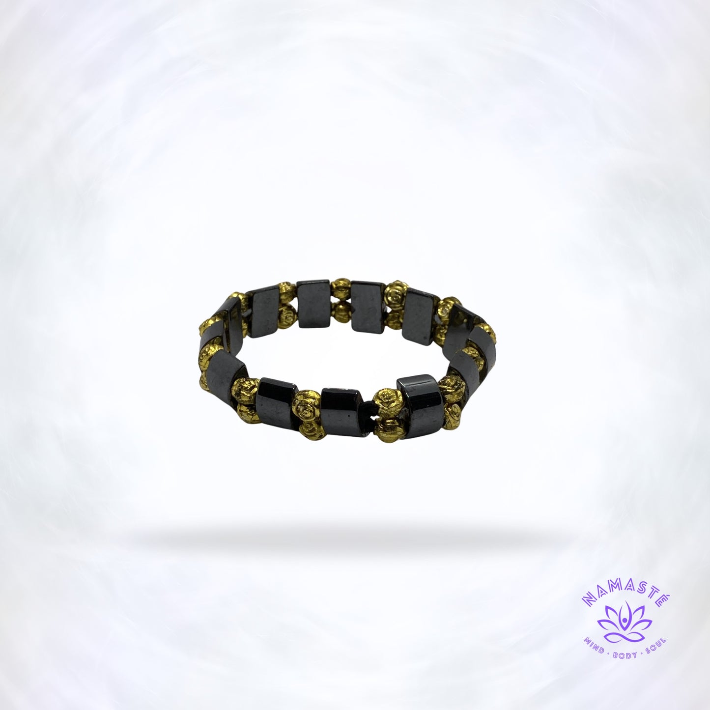 hematiet armband met gouden roosjes