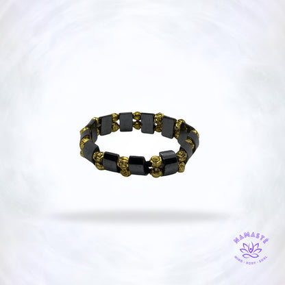 hematiet armband met gouden roosjes