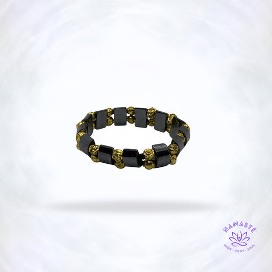 hematiet armband met gouden roosjes