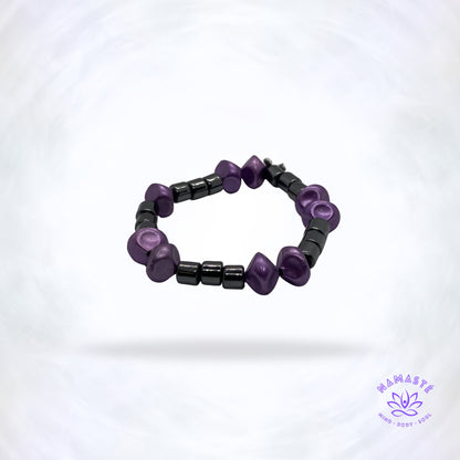 hematiet armband met paarse trendy parels