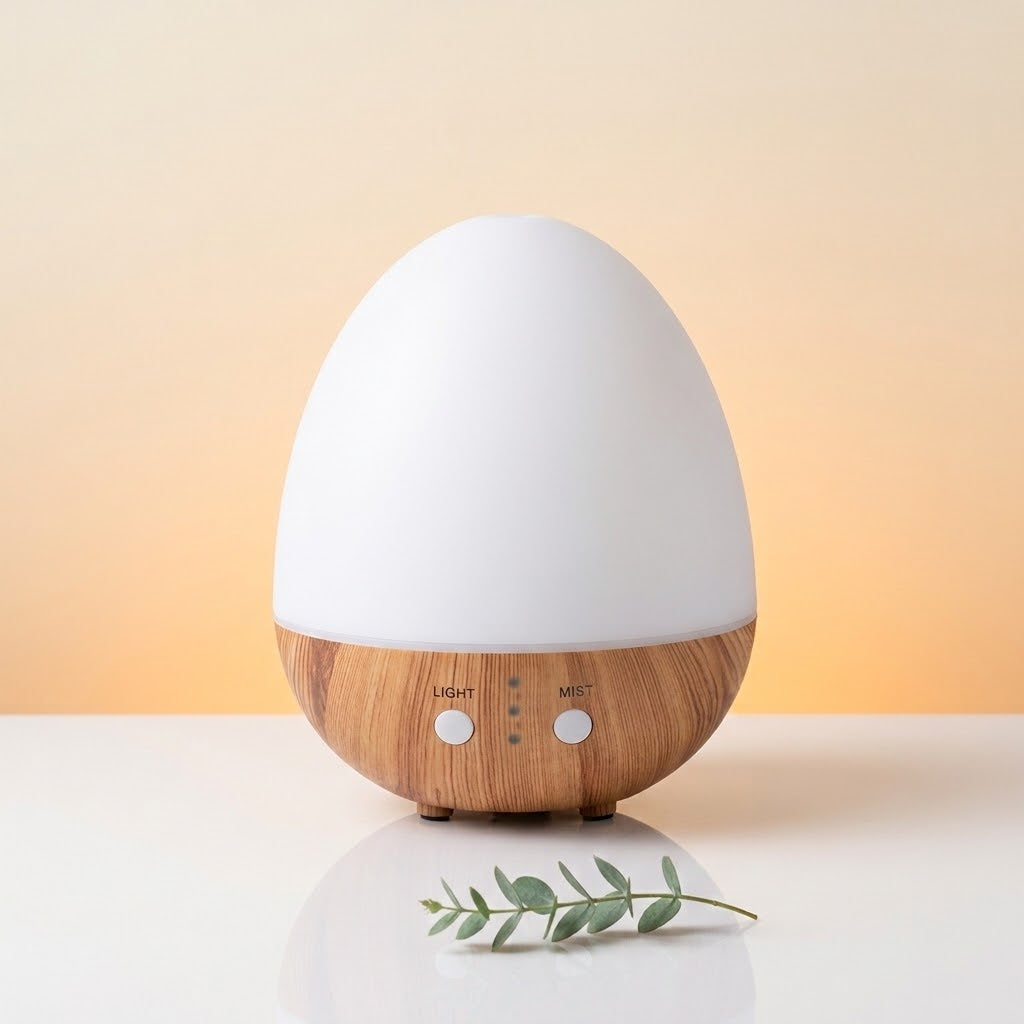 diffuser op een gradient achtergrond op witte tafel met takje