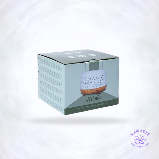 Aroma diffuser Nebula rond – wit met houtmotief, ultrasoon systeem dat etherische oliën vernevelt voor rust, wellness en natuurlijke geurverspreiding.