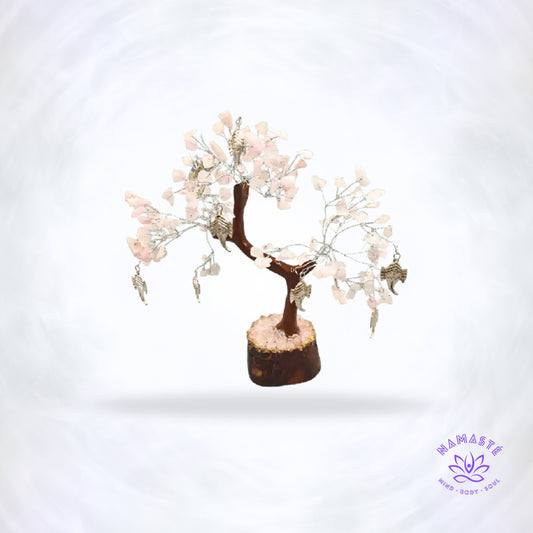 Rozenkwarts edelsteenboom met Ganesha-ornament – liefde, wijsheid en innerlijke rust in één decorstuk.