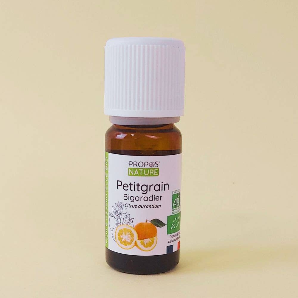 petitgrain olie propos'nature op een beige achtergrond